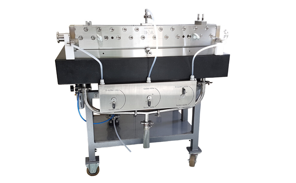 Reinigungsstation für Schlitzdüsen